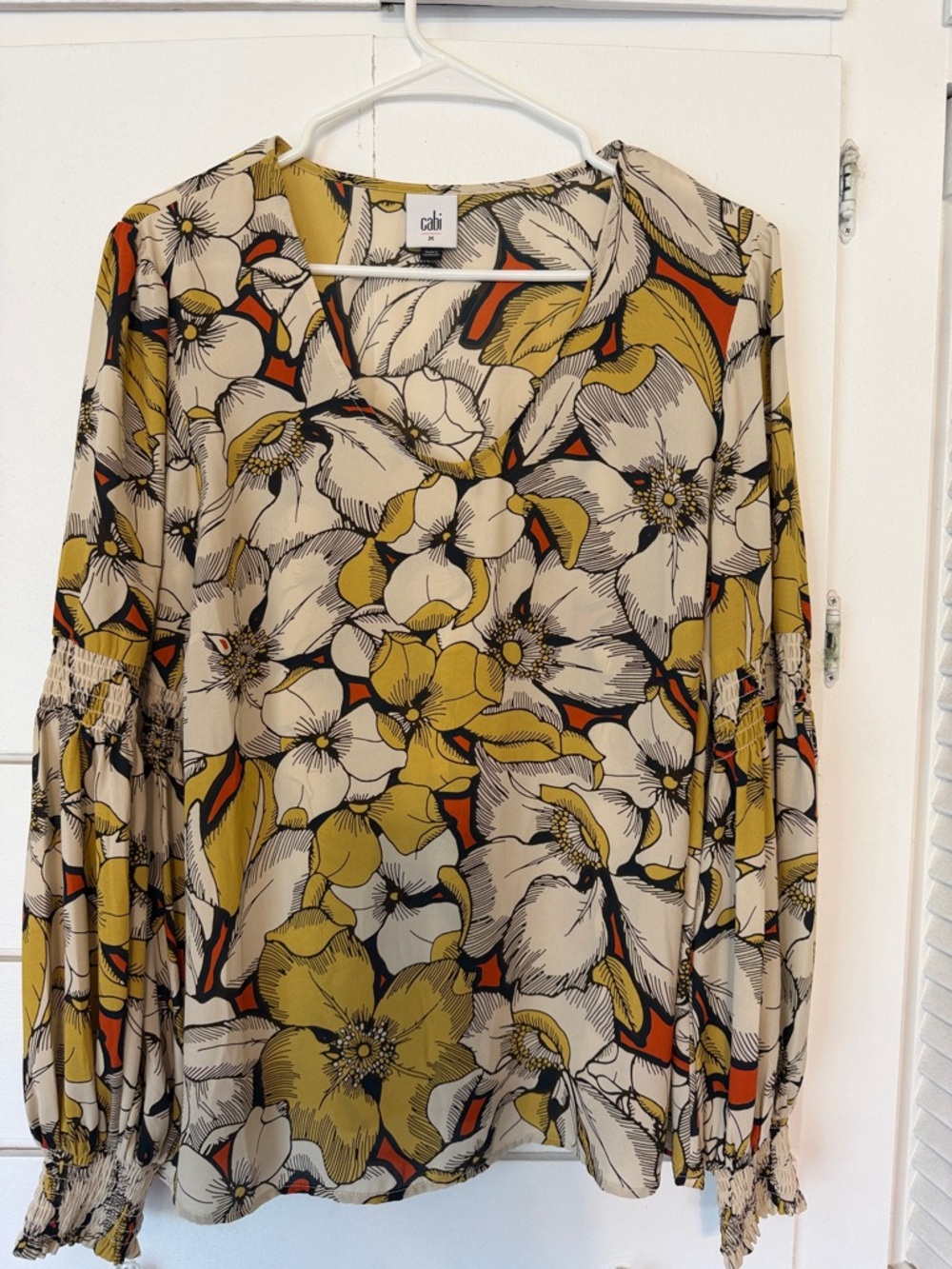 CAbi Floral V-Neck Blouse in Mustard, Cream & Black with Orange Accents